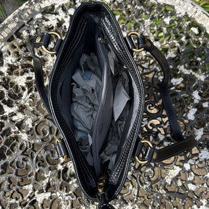 Black "Emilia" Italian Leather Bucket Bag with Side Buckle Details (open)