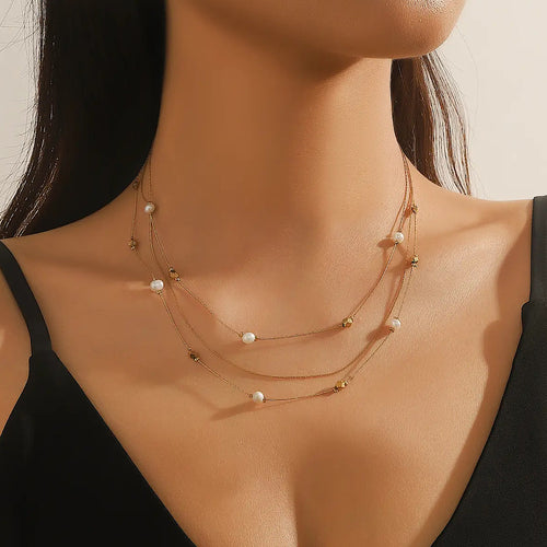Delicate Gold & Pearl Triple Stainless Steel Chain Necklace (on model)